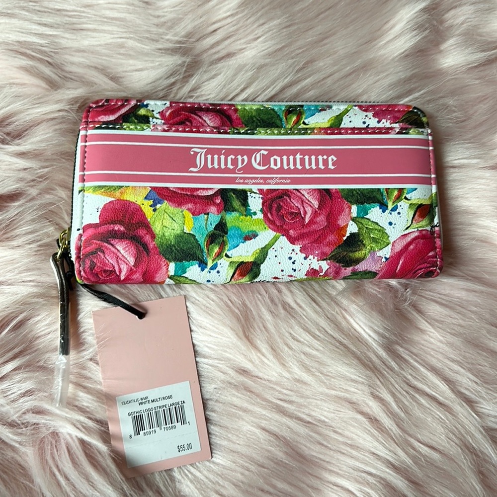 Juicy couture wallet new with tag!! Beautiful pink floral design.